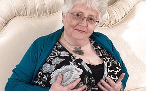 <b>Big breasted</b> British granny playing with herself